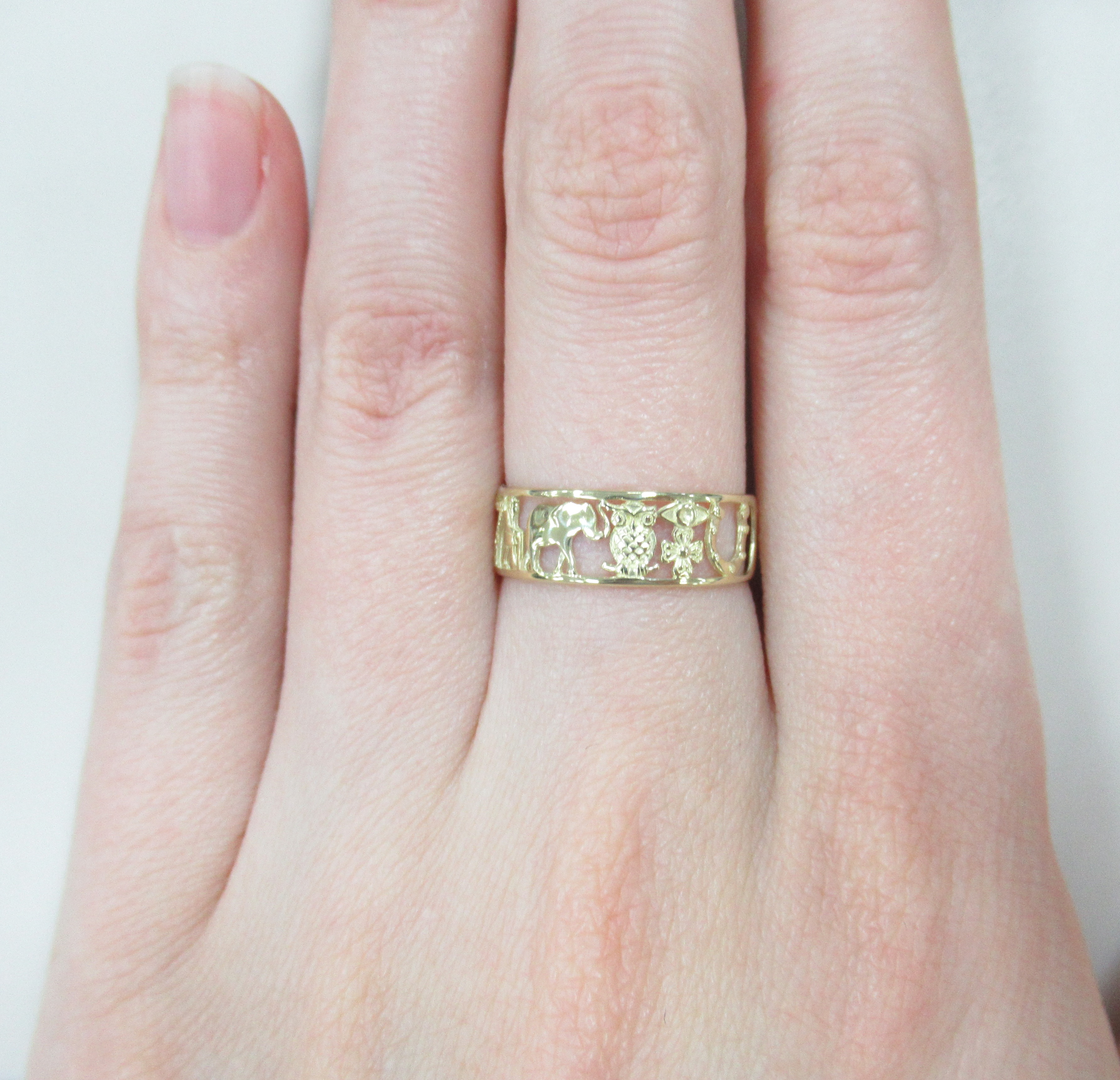 Кольцо из желтого золота "Символы счастья и удачи"